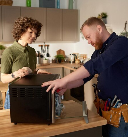 Step-by-step process for effective microwave repair by skilled technicians. Efficient Microwave Repair Steps