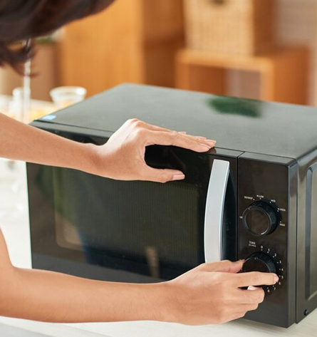 Upper Appliance technicians diagnosing and fixing common microwave problems, including heating issues and electrical malfunctions. Common Microwave Issues