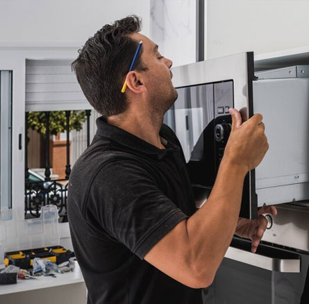 Technician Delivering Reliable Microwave Appliance Repairs in Cypress Quick Microwave Repair Service