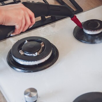 A dedicated technician providing immediate stove repair service, ensuring your stove is fixed quickly and efficiently, anytime you need it. Immediate Stove Repair Service