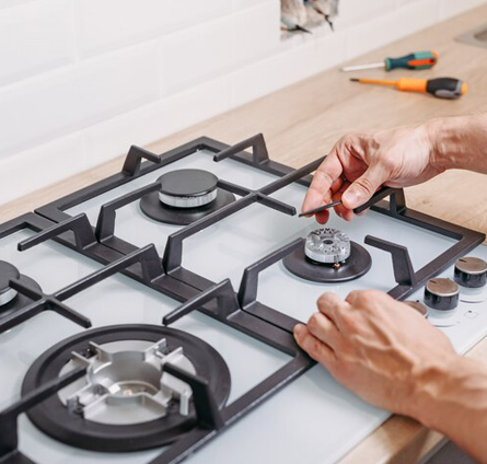 Comprehensive stove repair services being provided in San Antonio, featuring technicians addressing various stove-related issues in residential and commercial settings. Comprehensive Stove Services in San Antonio